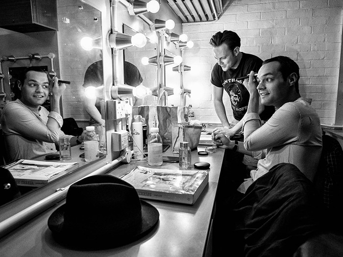 Matt Buswell (sitting) and Nick Pritchard (who plays Albert Herring) in the dressing room. Dress rehearsal of Albert Herring by Benjamin Britten. Royal College of Music, Bitten Theatre, Prince Consort Road, London. June 28, 2015. Photo: Edmond Terakopian