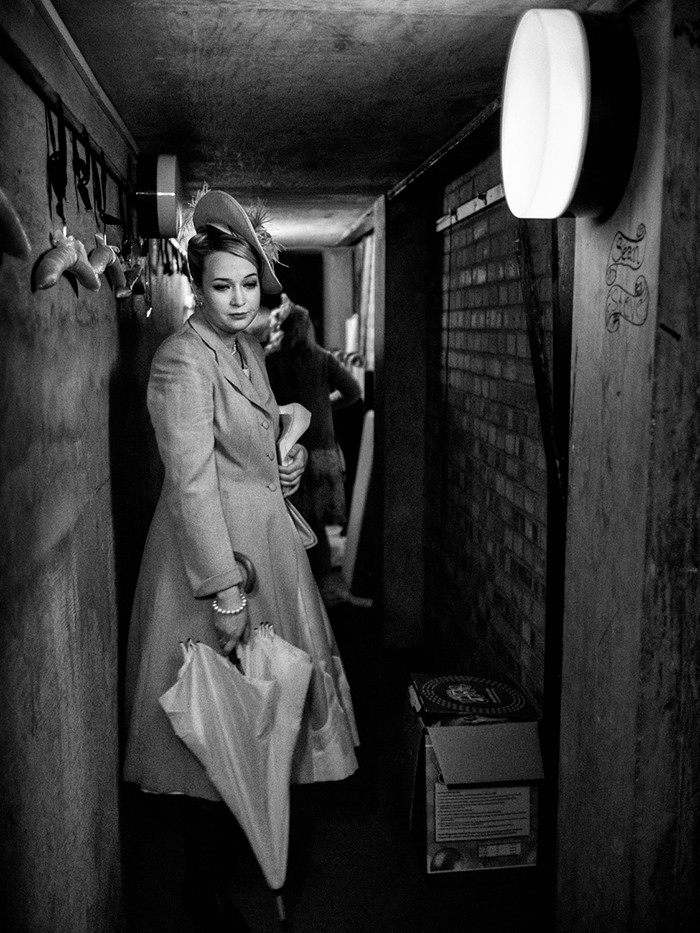 Miss Wordsworth, played by Natasha Day, waits in the "cross over" tunnel backstage before going on to perform in the second act. Albert Herring by Benjamin Britten. Royal College of Music, Bitten Theatre, Prince Consort Road, London. July 06, 2015. Photo: Edmond Terakopian